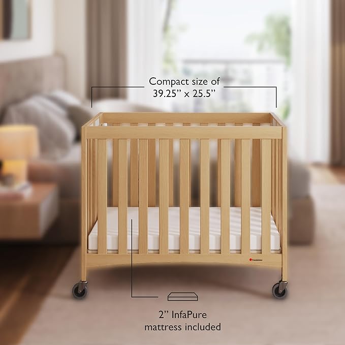 Foundations Travel Sleeper Wood Compact Folding Crib with 2” InfaPure Foam Crib Mattress and Commercial Grade Casters for Hotels, Natural