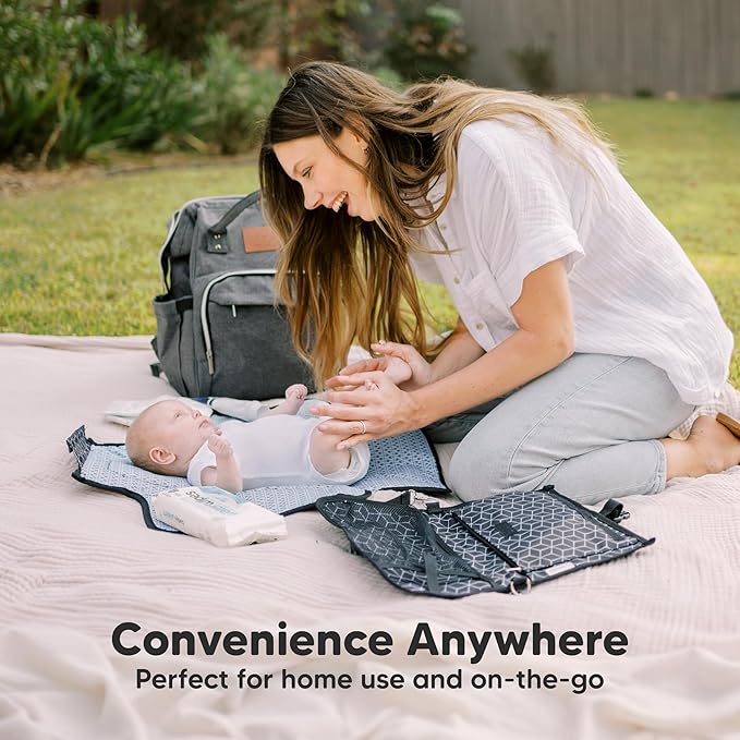 KeaBabies Portable Diaper Changing Pad - Large Waterproof Baby Changing Mat, Compact Travel Diaper Clutch, Functional Pockets Fit Newborn Essentials, Wipeable & Padded Baby Changer (Pets & Paws)