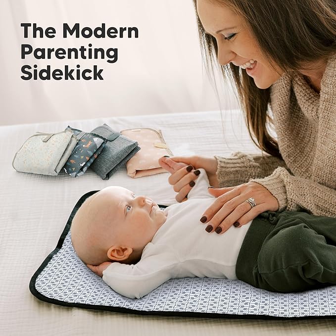KeaBabies Portable Diaper Changing Pad, Easy Wipe Clean - Foldable Waterproof Baby Changing Mat for Diaper Bag, Compact, Lightweight, 25x13 Baby Changer Travel Essential,Machine Washable(Pets & Paws)