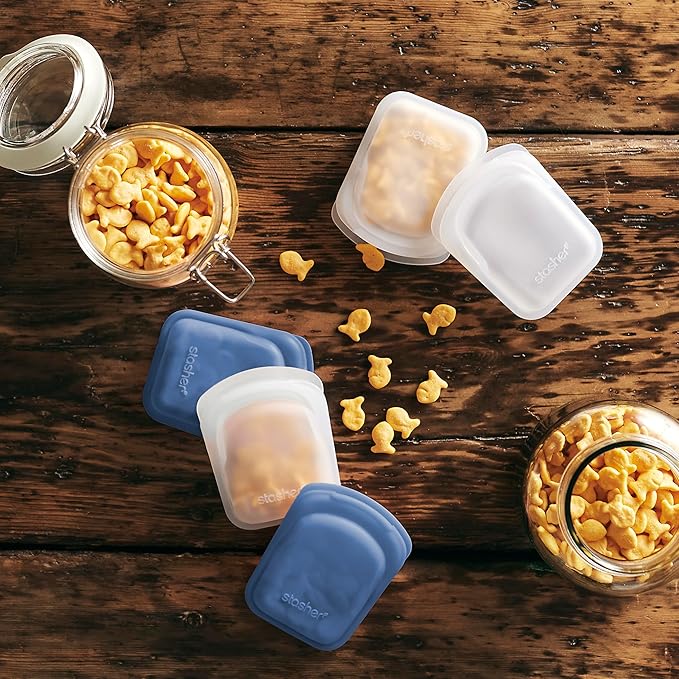 Stasher Premium Silicone Reusable Food Storage Pocket 2-Pack, Clear + Deep Ocean, Multi-Use Food Storage Bags, Lunch Bag, Travel Containers, BPA Free, Leak-free, Dishwasher-Safe, Eco-friendly, 4 Oz